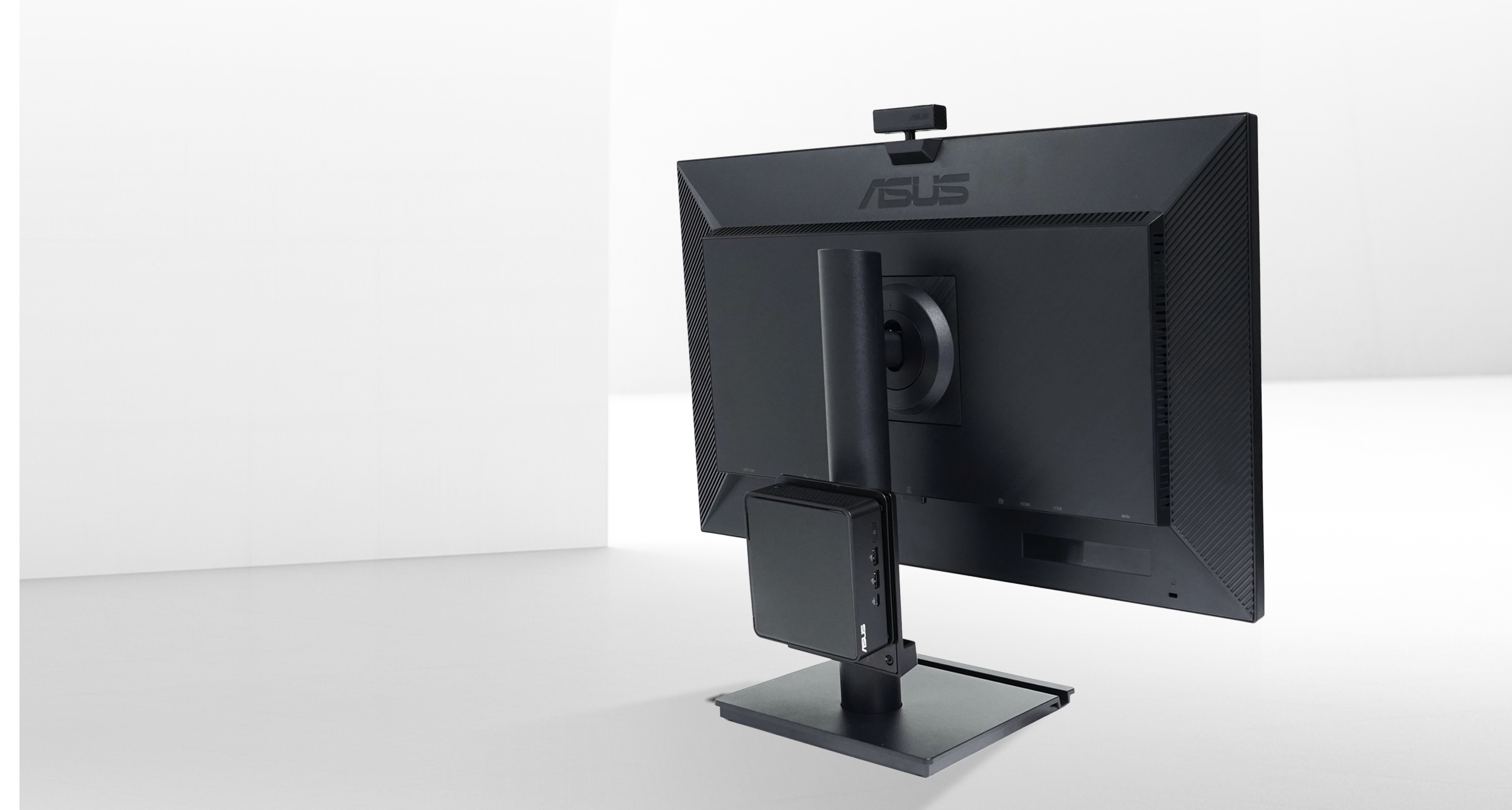 A mini PC can be attached to the rear of the ASUS BE249QFK monitor